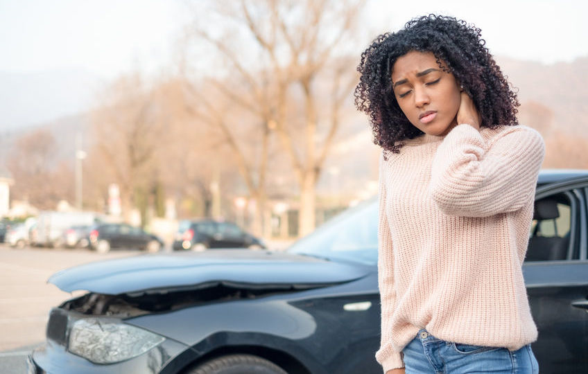 Car accident and black woman feeling pain